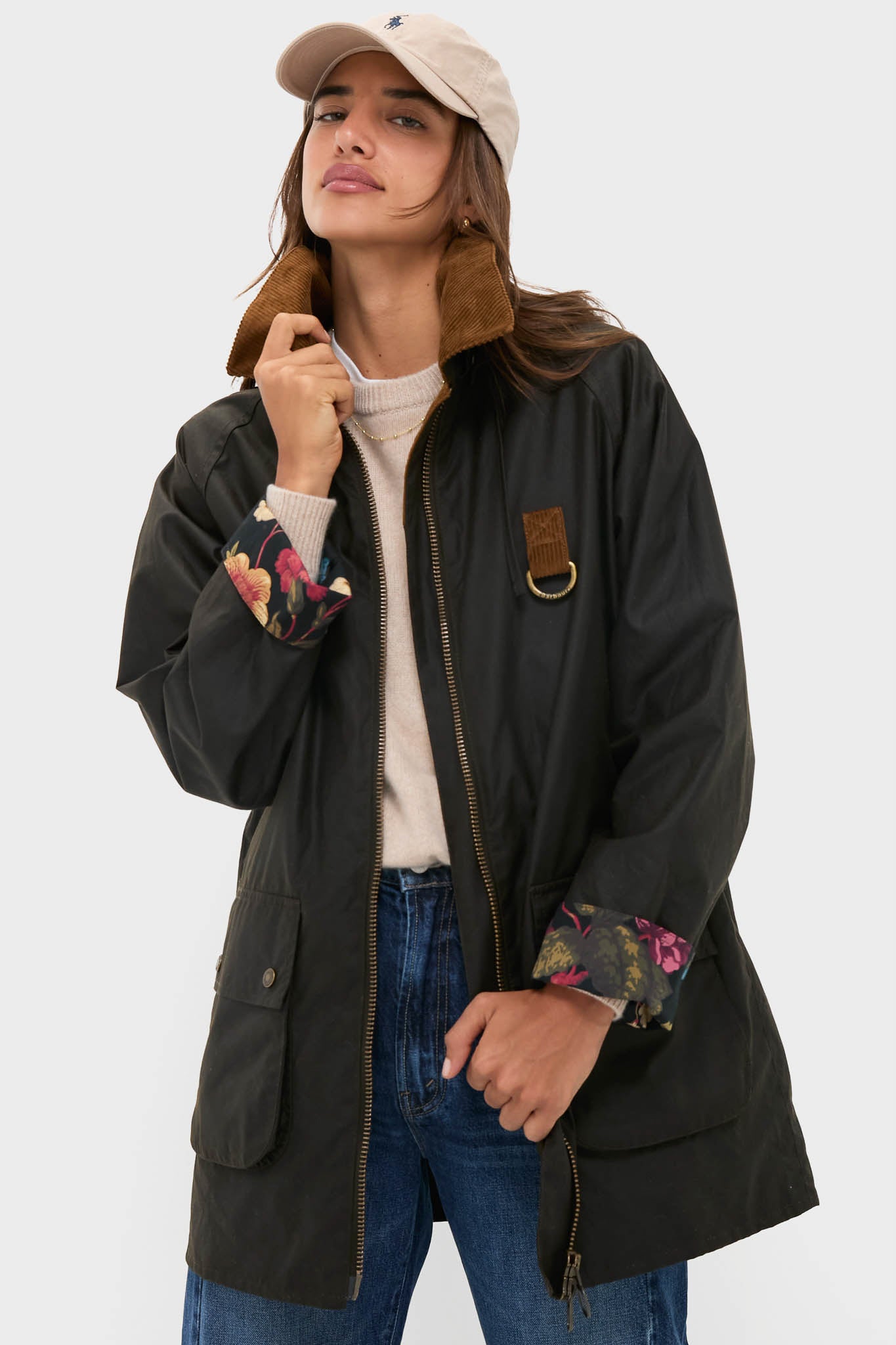 A woman wearing a Barbour x Metrobazaarstore black jacket.